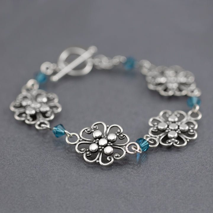 Sterling Silver Filigree Flowers with Blue Swarovski Faceted Bicone Stackable Bracelet - AlexandraDeer